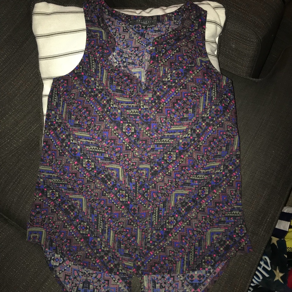 Sleeveless button up blouse